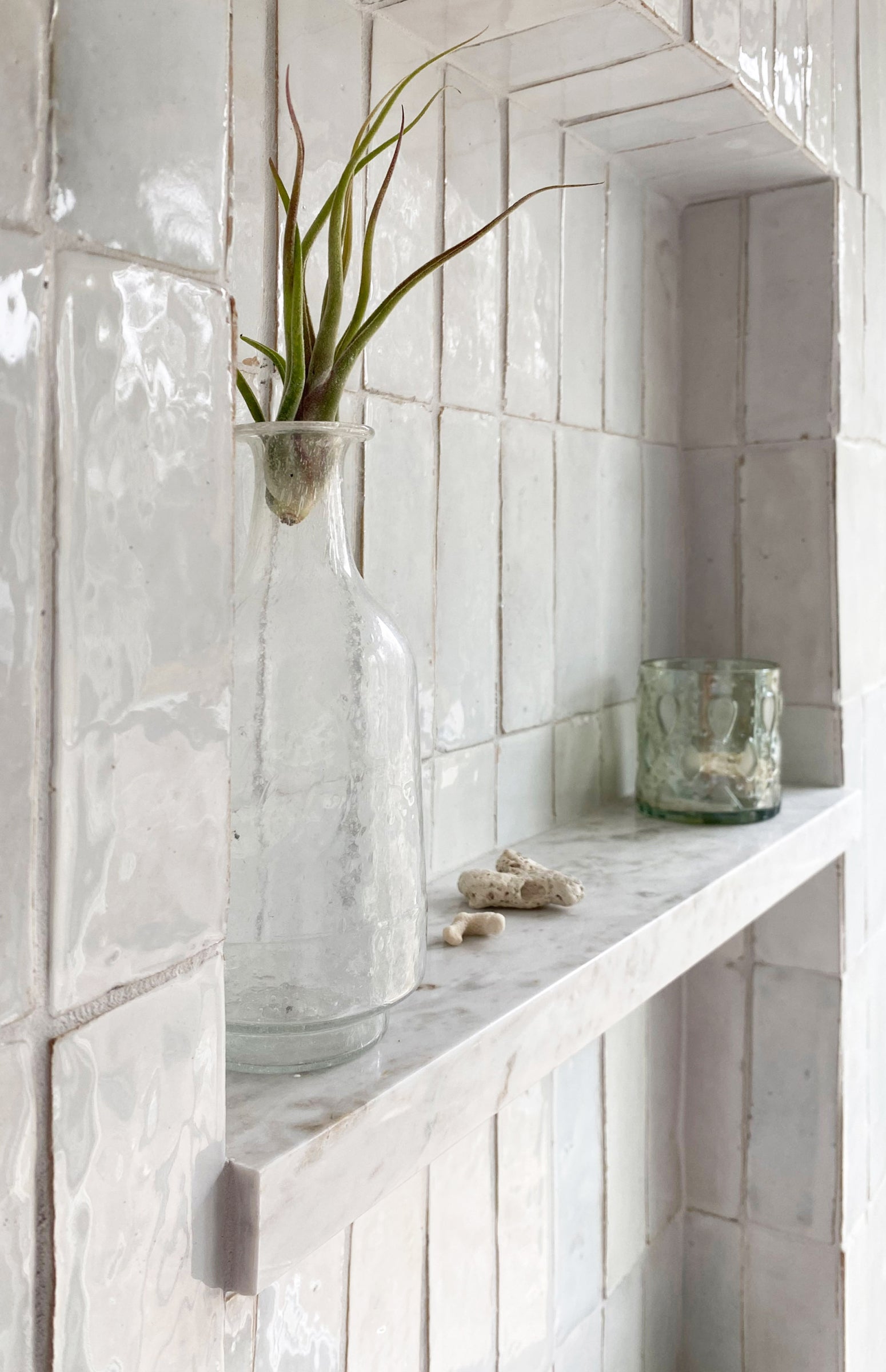 white rectangle zellige tile installed in shower