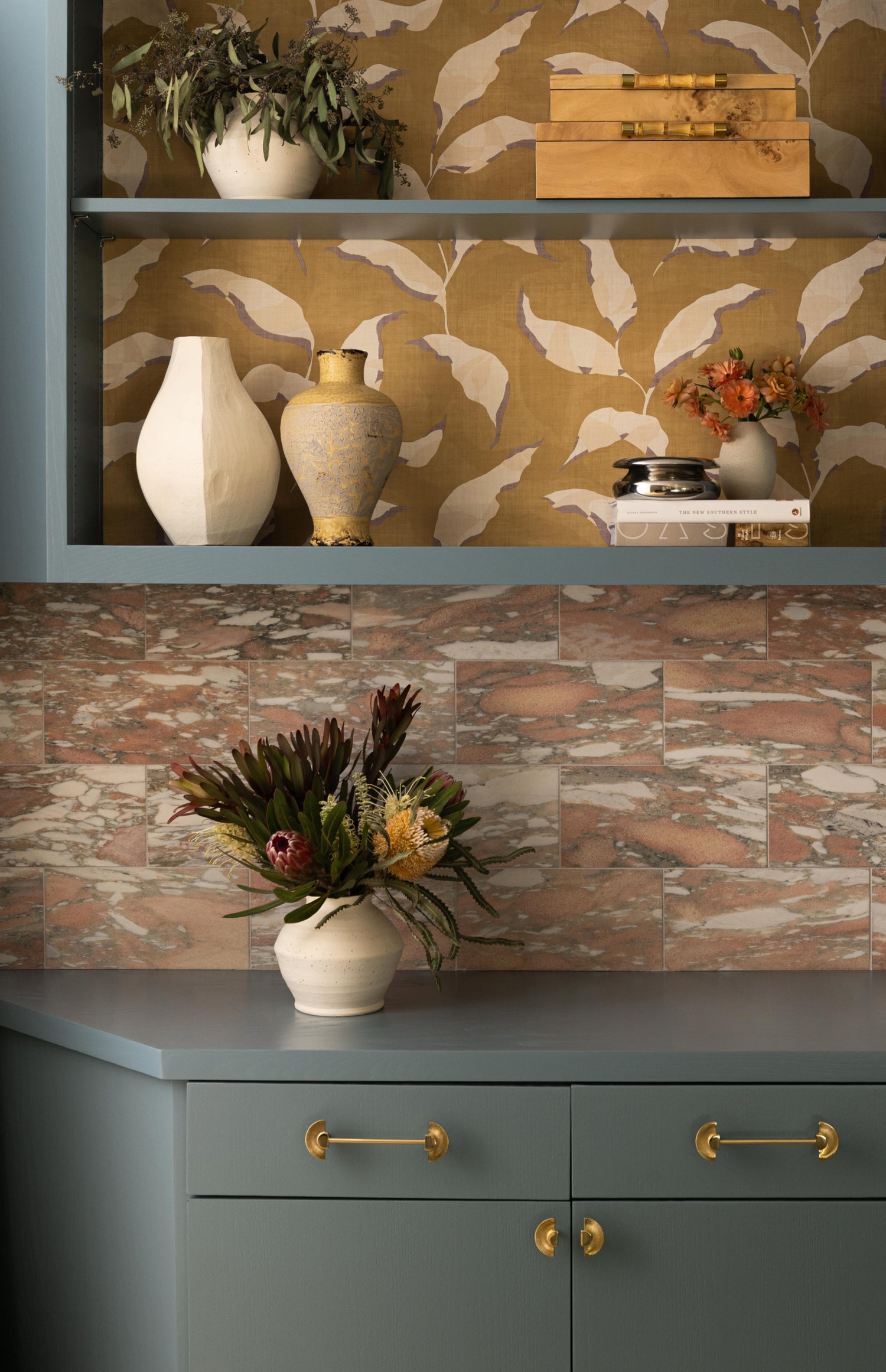 norwegian rose rectangle marble tile installed as backsplash among cabinetry