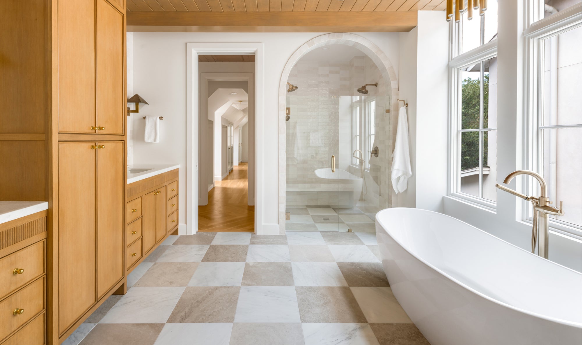 limestone and marble checkerboard flooring in a bathroom