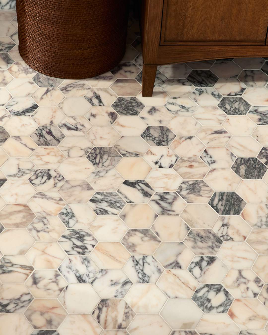 Small space, big marble energy. Calacatta Viola Hexagon Mosaic makes a convincing case for going bold underfoot.

Tile: Calacatta Viola 2 Inch Hexagon Mosaic Marble Tile | Honed
Image Source: @rejuvenation (image 2)
