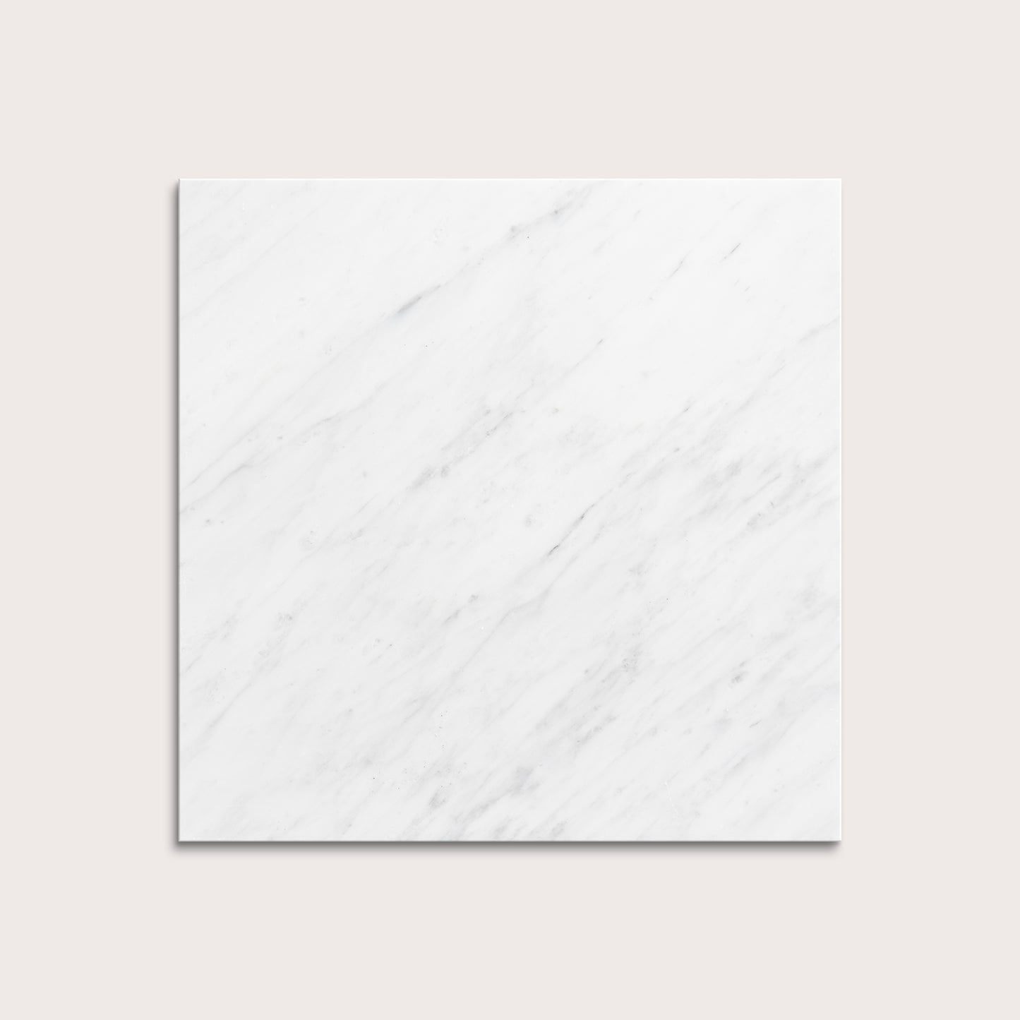 White casablanca carrara marble tiles on a light gray background