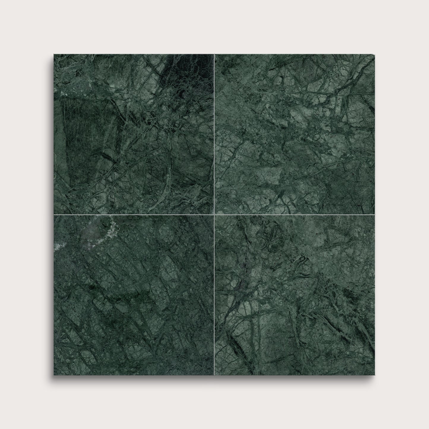 Four green marble tiles arranged in a grid on a light gray background