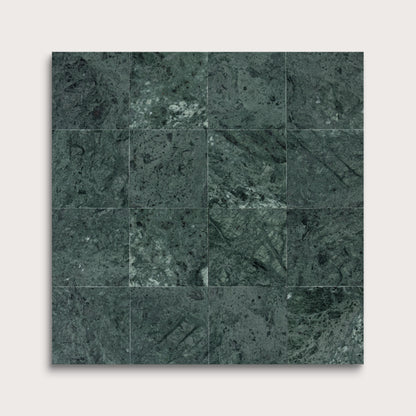 Green marble tile pattern on a white background