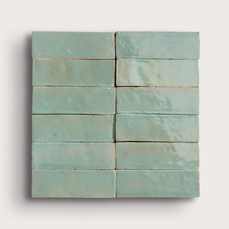 green rectangle zellige tile on light gray background