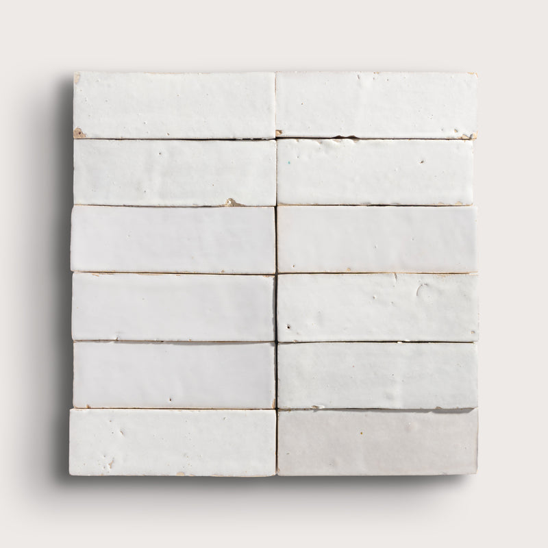 snow white rectangle zellige tile on a light grey background