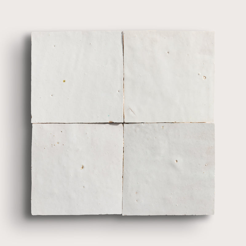 snow white square zellige tile on a light grey background