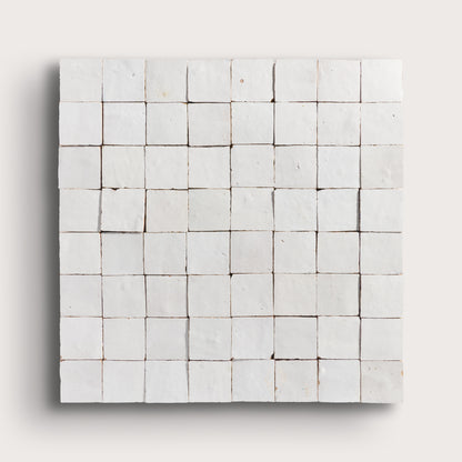 snow white square zellige tile on a light grey background